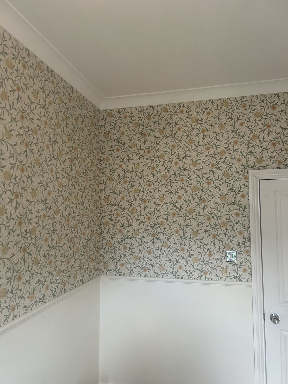 Wallpaper hanging project completed by A1 Decorating in London