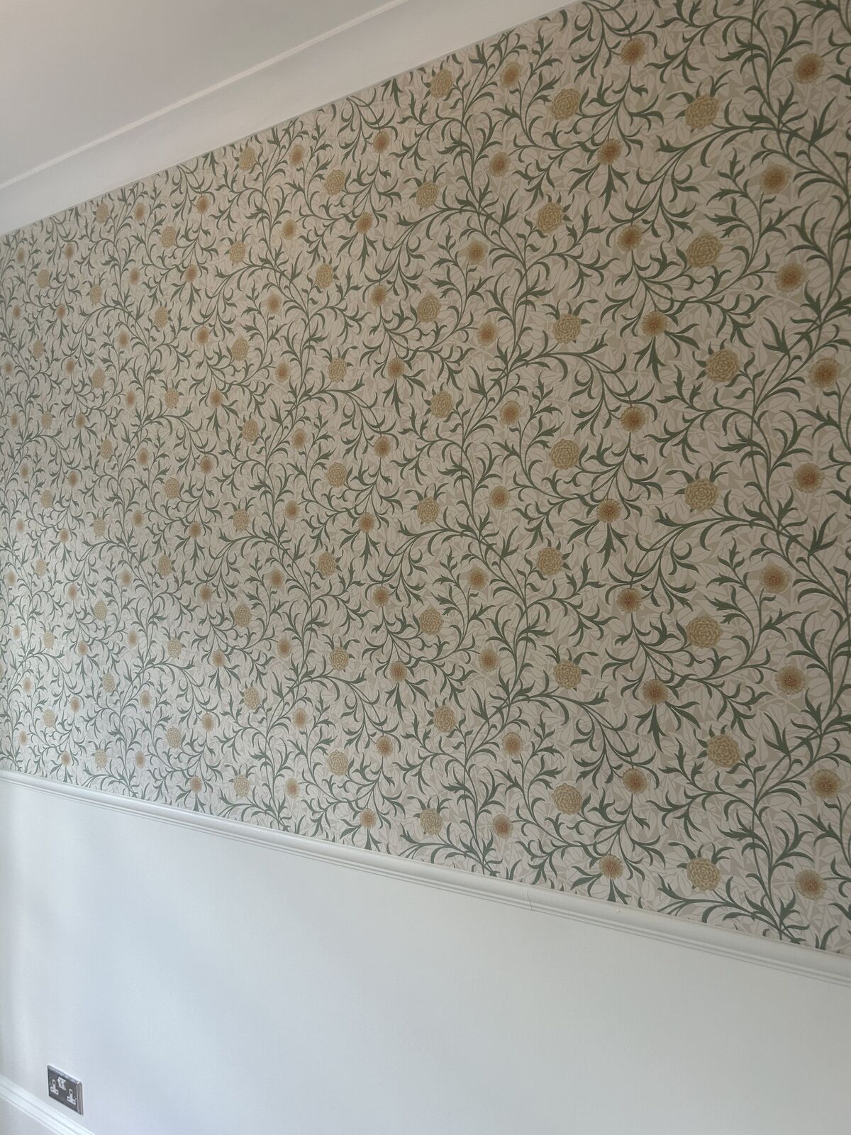 Wallpaper hanging project completed by A1 Decorating in London