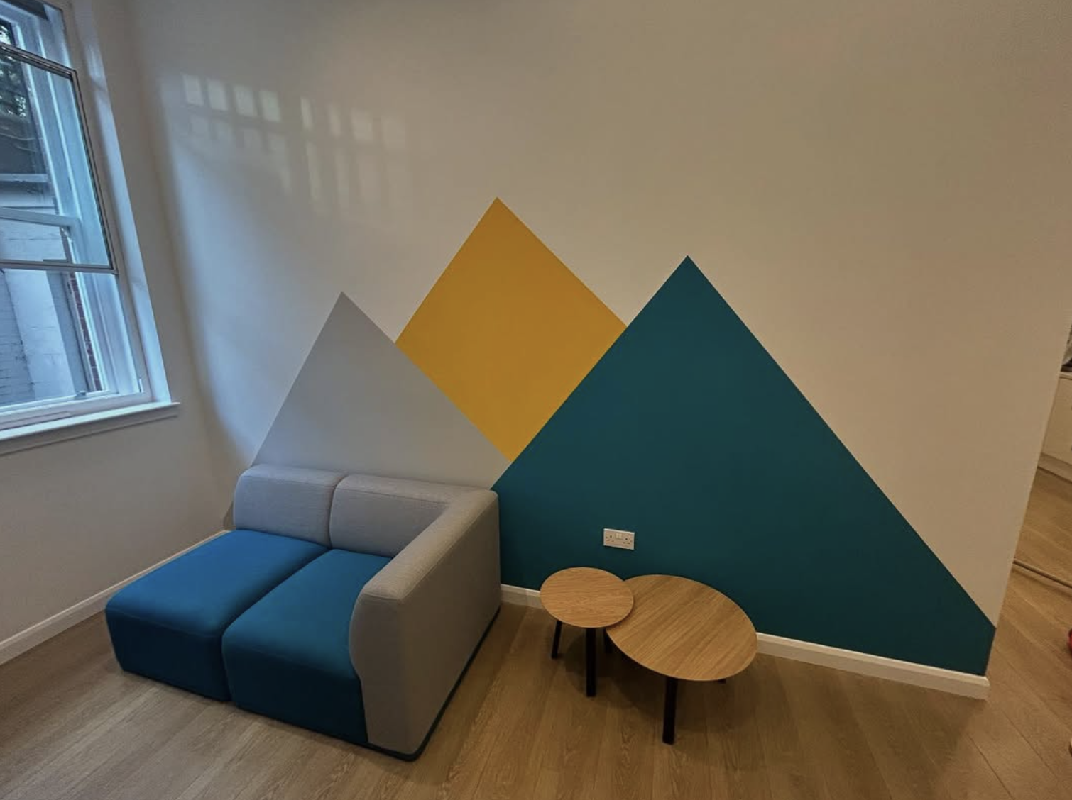 Geometric feature wall completed by A1 Decorating
