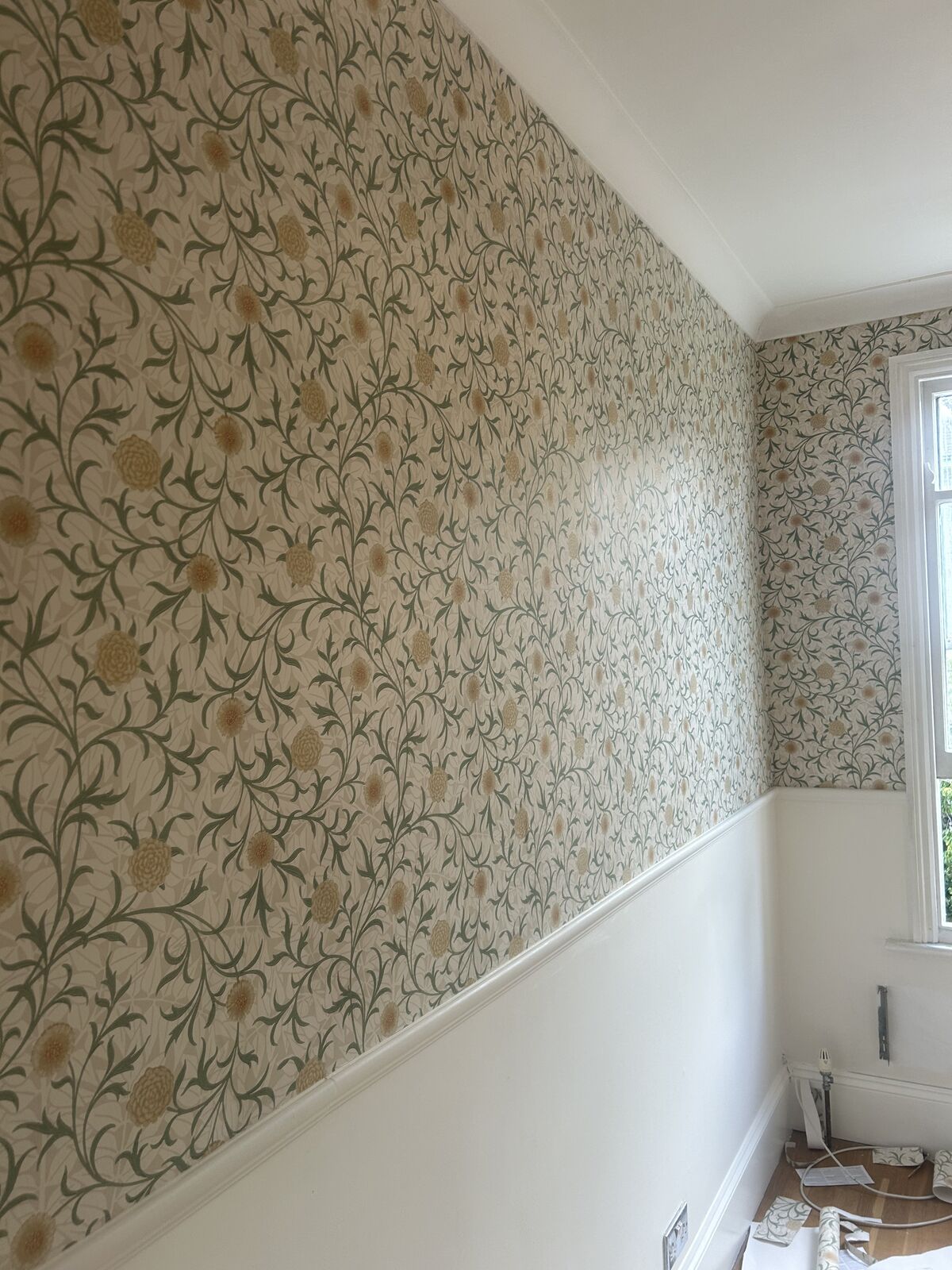 Wallpaper hanging project completed by A1 Decorating in London