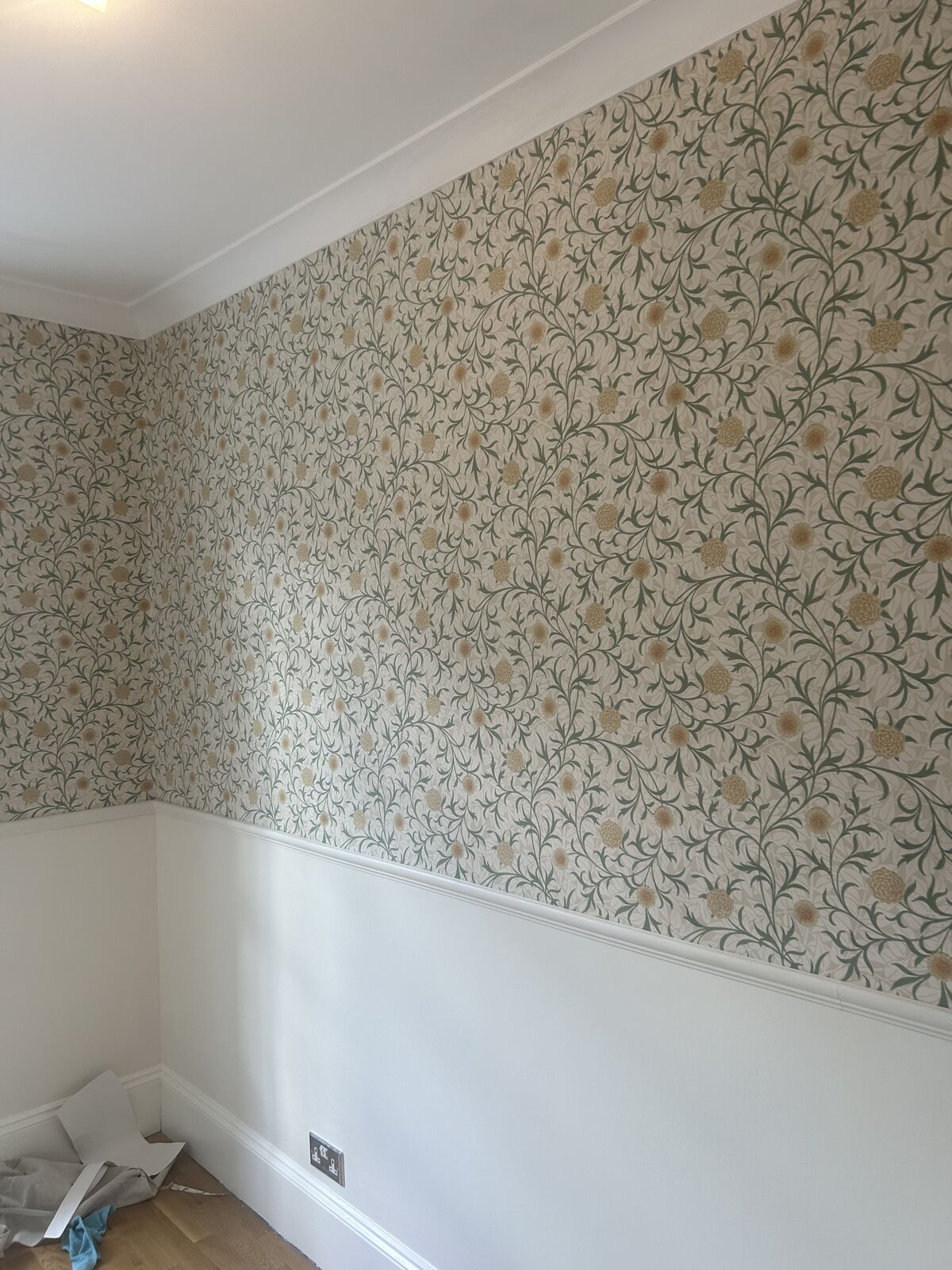 Wallpaper hanging project completed by A1 Decorating in London
