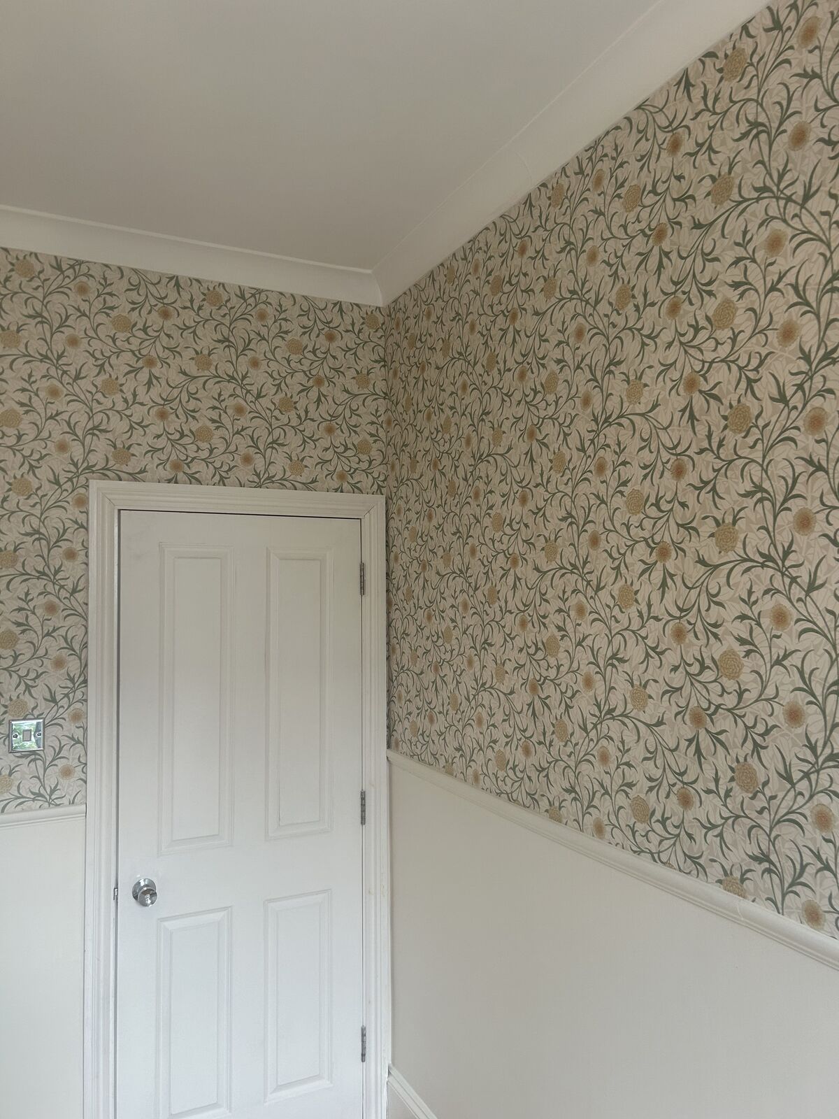 Wallpaper hanging project completed by A1 Decorating in London